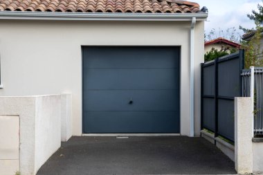 https://depositphotos.com/photo/facade-gate-garage-sectional-grey-dark-home-door-gray-residential-689761174.html